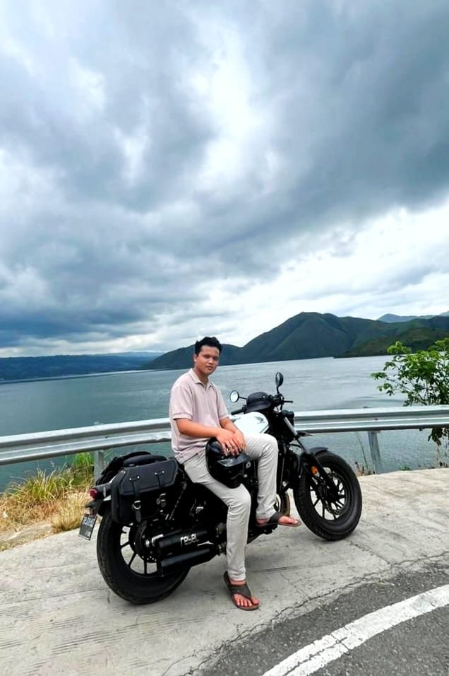 MARULI TUA SIHOMBING
